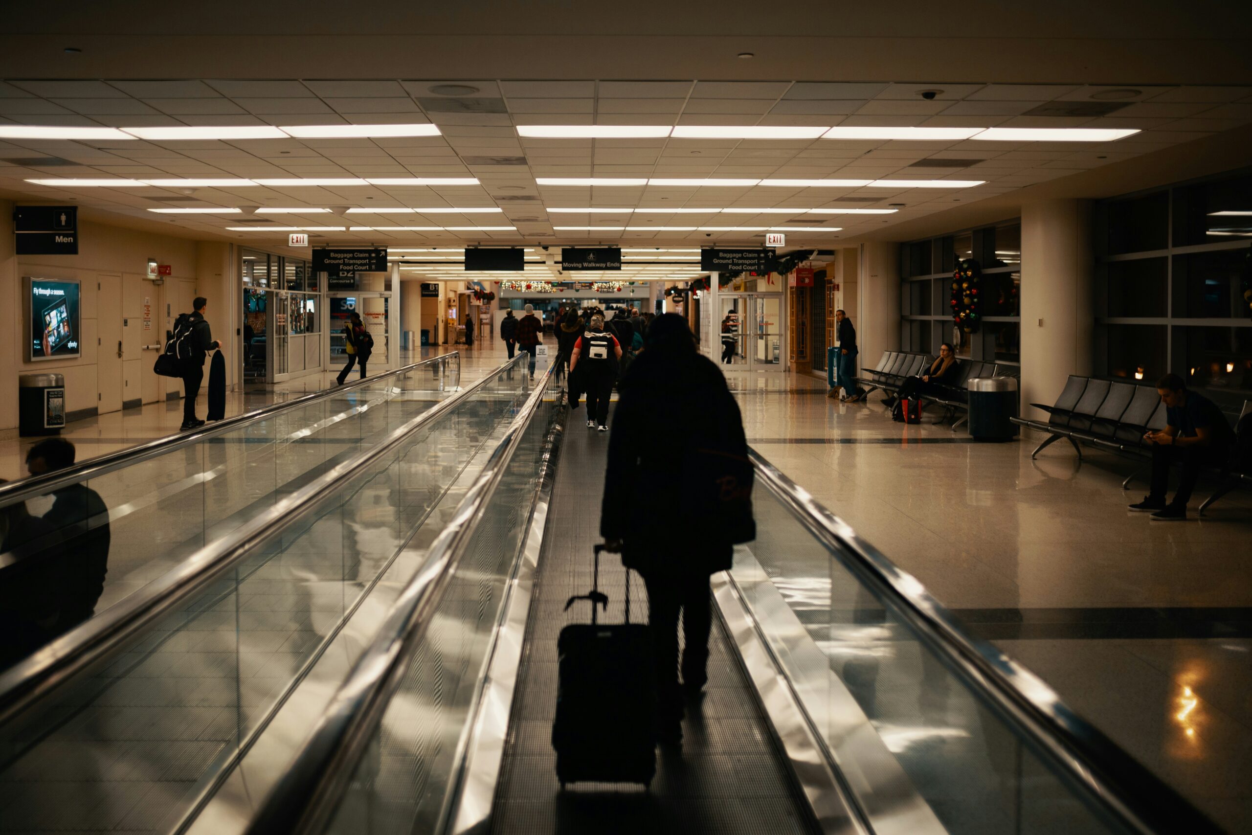 A traveler filling out a form for baggage delay insurance